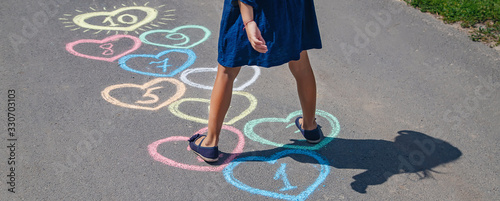 Children's hopscotch game on the pavement. selective focus. photo