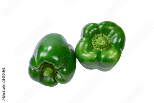 Group of green bell peppers isolated on white background.
