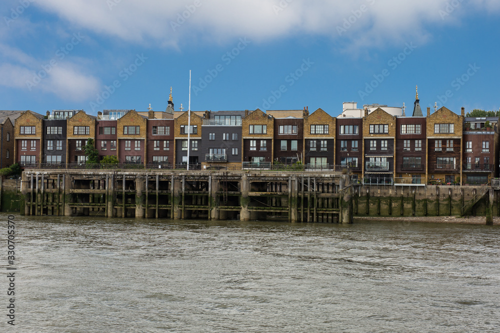 Houses along the River Thames near the Canary Wharf