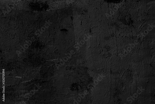 Abstract black background. Black stucco texture. Dark rough surface. © sandipruel