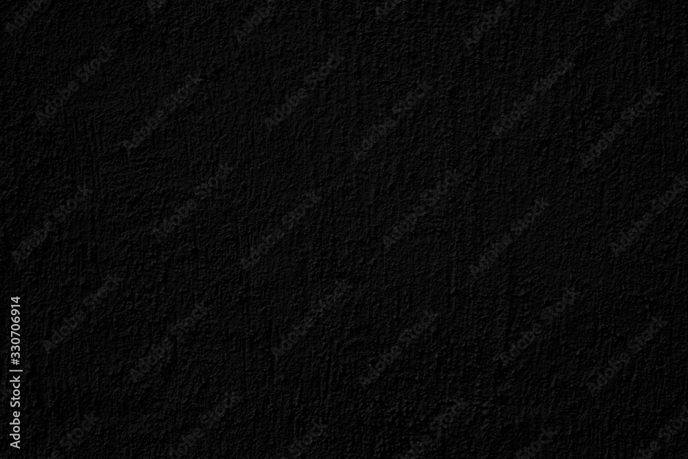 Abstract black background. Black stucco texture. Dark rough surface. Abstract black background. Black stucco texture. Dark rough surface.