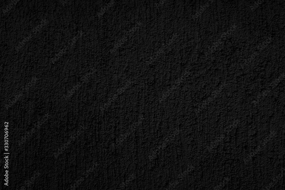 Abstract black background. Black stucco texture. Dark rough surface. Abstract black background. Black stucco texture. Dark rough surface.