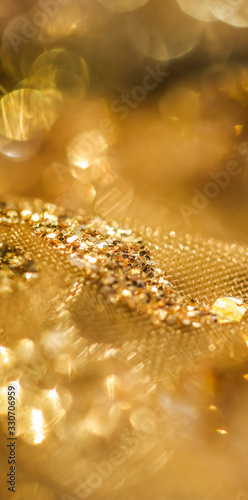 Golden abstract blur defocused background. Concept for New Years Eve, Christmas and happy holidays