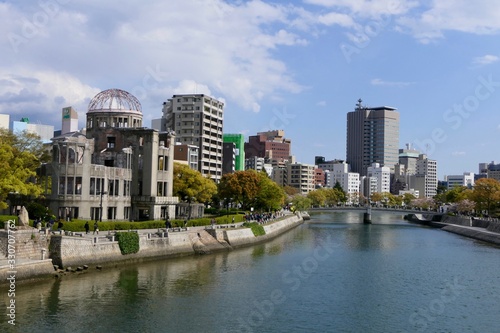 Atomic bomb dome before river with skyline, Hiroshima, Japan © HWL Photos