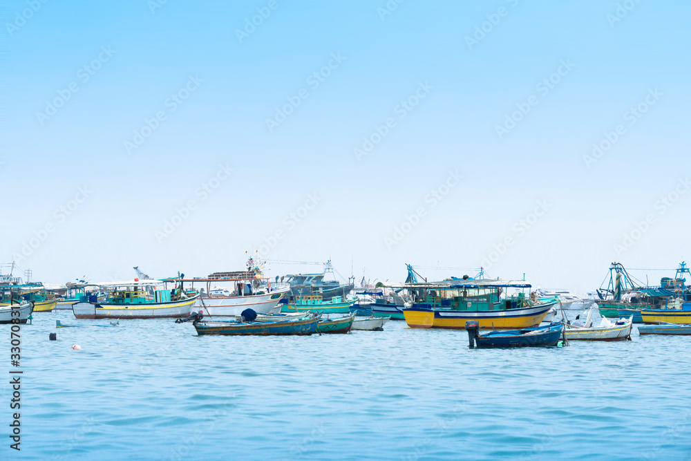 Fishing Boats Under Blue Sky