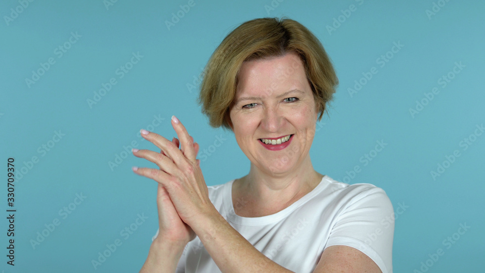 The Clapping Old Woman Applauding Isolated on Blue Background