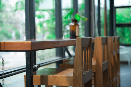 wood chairs in the restaurant   © naturalvigator