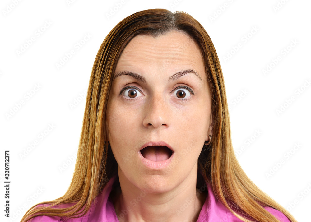 Shocked expression on a womans face, isolated on a white background Shocked expression on a womans face, isolated on a white background
