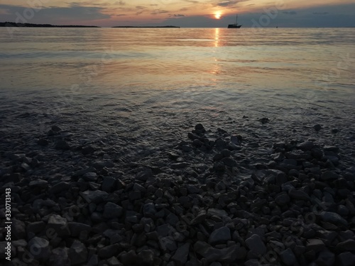 Romantic sunset on the beach in Fazana in Croatia in 2019. © Csilla