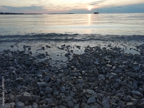Romantic sunset on the beach in Fazana in Croatia in 2019. © Csilla