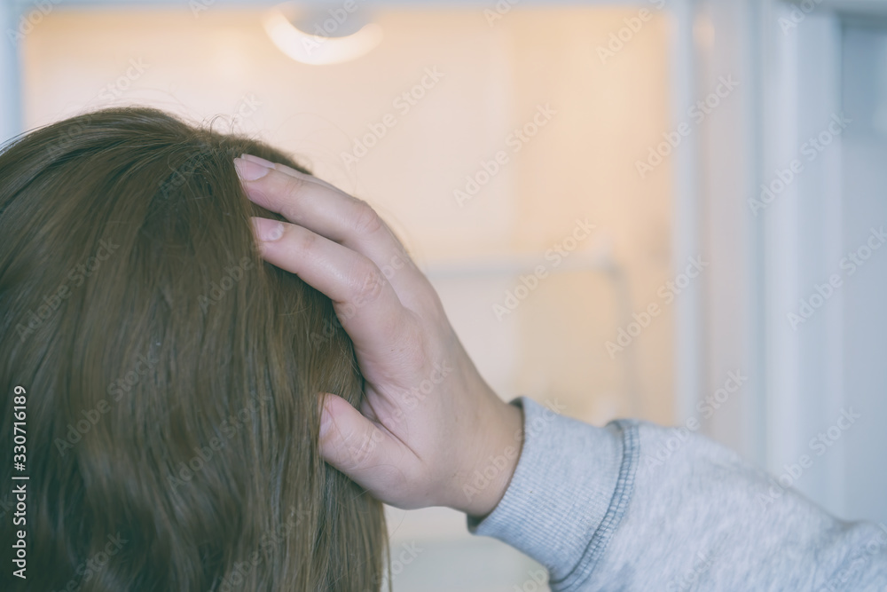 Naklejka premium Worried woman looking at empty refrigerator