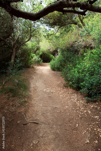 Sant Tomas, Menorca / Spain - June 25, 2016: The path to Binigaus beach, Sant Tomas, Menorca, Balearic Islands, Spain