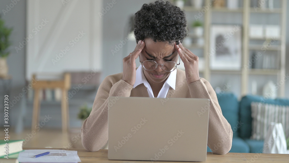 The Young African Girl Using laptop And Having Headache The Young African Girl Using laptop And Having Headache