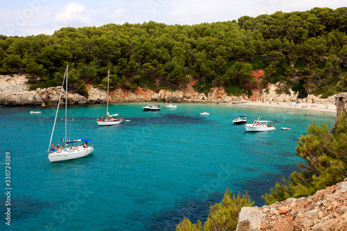 Es Migjorn Gran, Menorca / Spain - June 25, 2016: The Escorxada bay, Es Migjorn Gran, Menorca, Balearic Islands, Spain photo