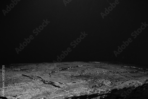 Fototapeta black stone on a black background