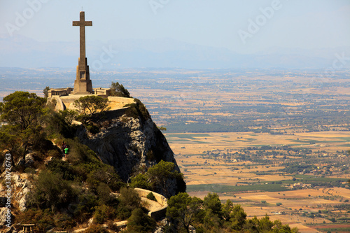 Felanitx, Majorca / Spain - August 25, 2016: Cross on a rock near Santuari de Sant Salvador Monastery, Santuario de San Salvador, near Felanitx, Majorca, Mallorca, Balearic Islands, Spain.