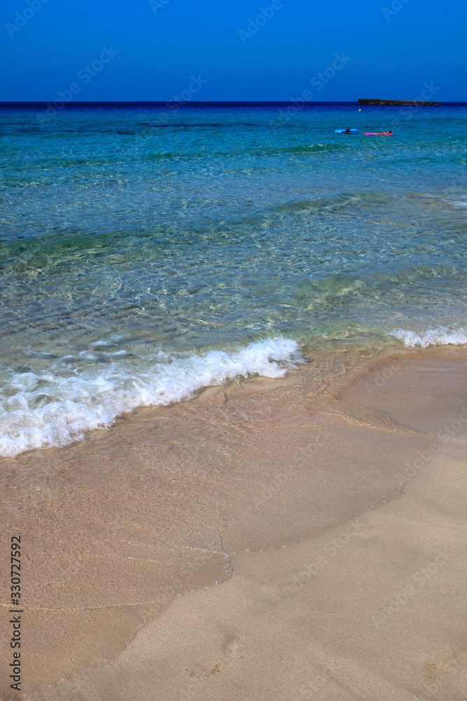 Son Bou, Menorca / Spain - June 22, 2016: Son Bou beach near Alaior, Menorca, Balearic Islands, Spain