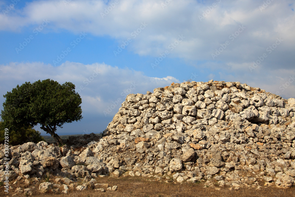 Torre d'en Galmés, Menorca / Spain - June 23, 2016: Prehistoric area and ruins at Torre d'en Galmés, Menorca, Balearic Islands, Spain