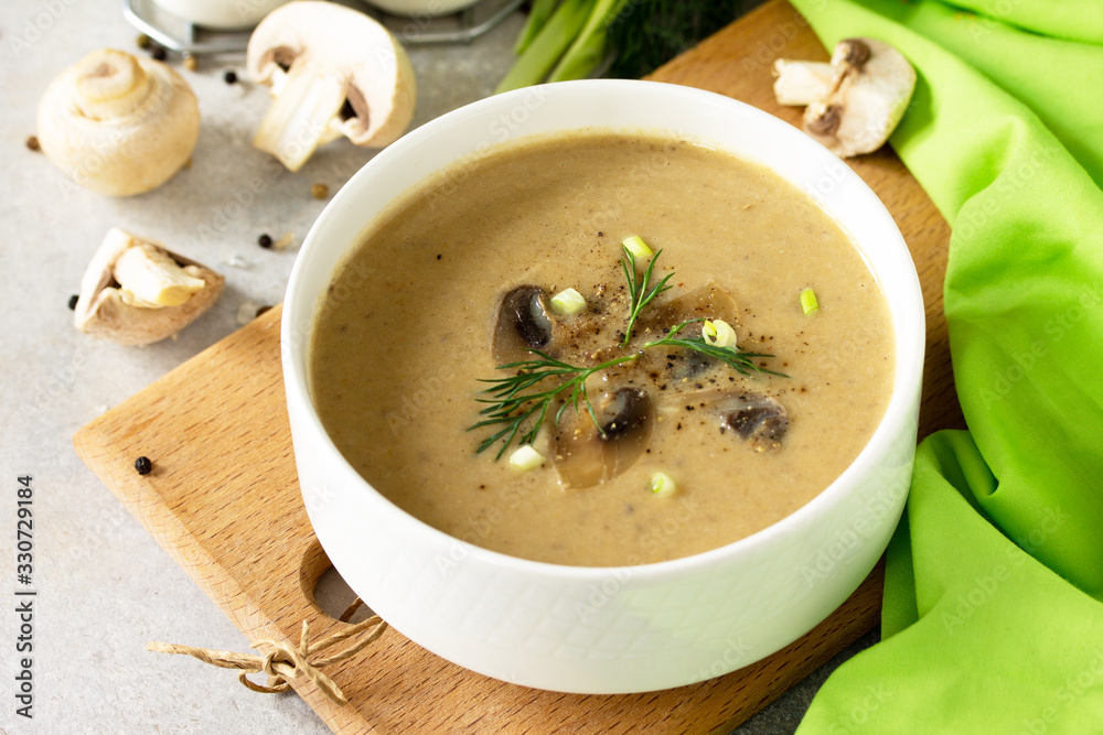 Vegan and diet healthy food. Mushroom soup puree with cream, champignons and vegetables. Vegan and diet healthy food. Mushroom soup puree with cream, champignons and vegetables.