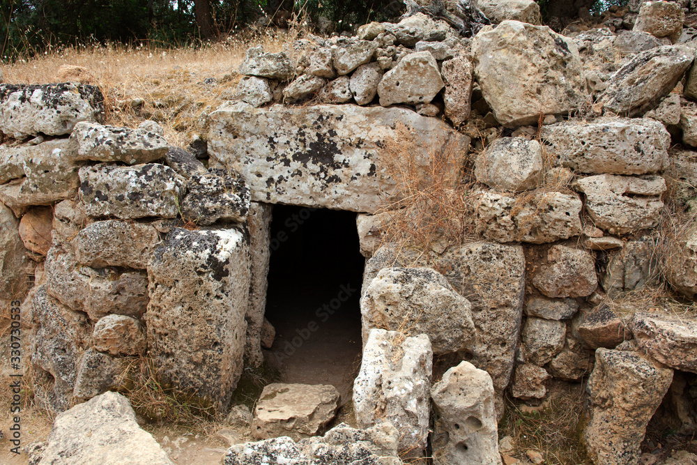 Talati de Dalt site, Menorca / Spain - June 23, 2016: Prehistoric site and ruins at Talati de Dalt, Menorca, Balearic Islands, Spain