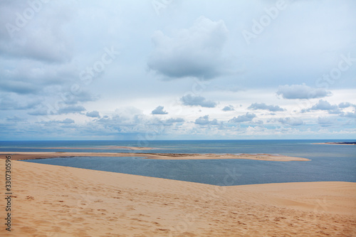 scenery with islet and sandy beach