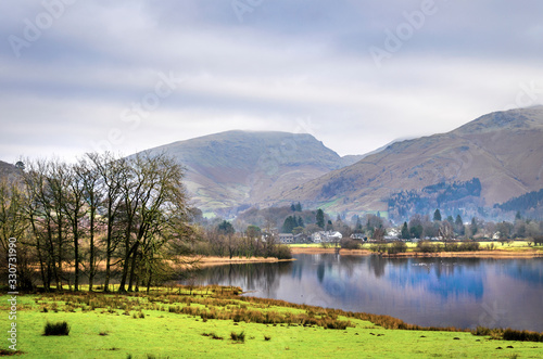 A view of Rydal water from the road with the Langdales range in the background. 