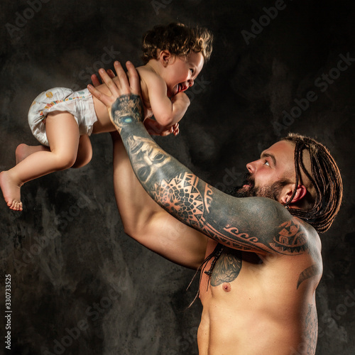 loving father throws up happy child