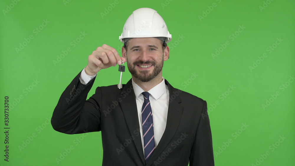 The Ambitious Engineer with House key and Money against Chroma Key The Ambitious Engineer with House key and Money against Chroma Key