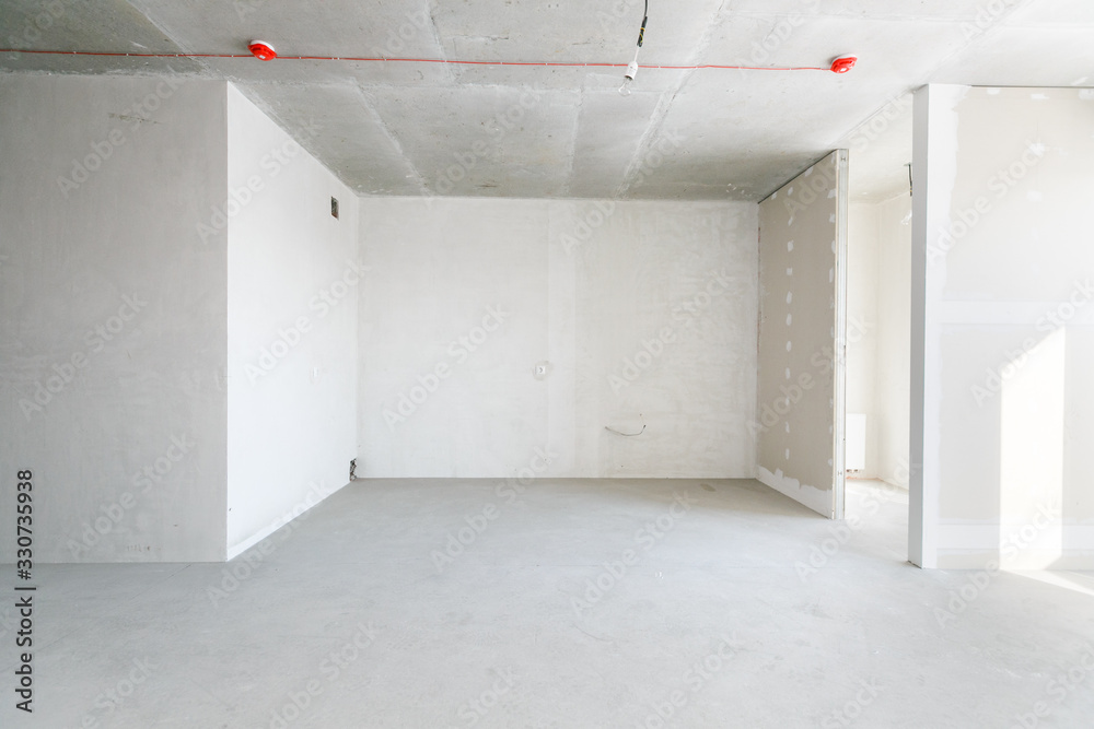 interior of the apartment without decoration in gray colors