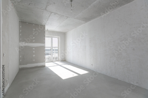 interior of the apartment without decoration in gray colors