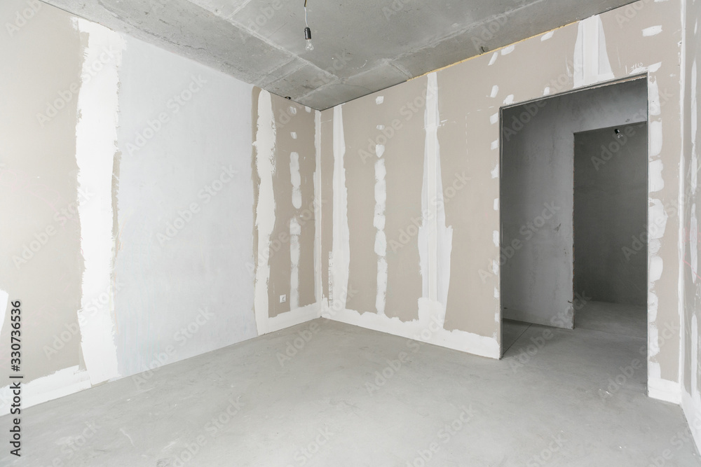 interior of the apartment without decoration in gray colors interior of the apartment without decoration in gray colors