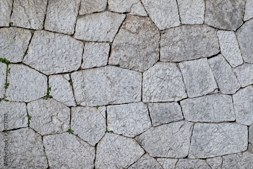 19th-century polygonal masonry of grey limestone