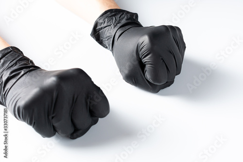 Hands in latex gloves. Protective gloves