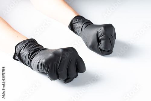 Hands in latex gloves. Protective gloves