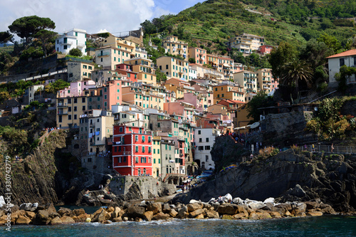 Riomaggiore   SP    Italy - April 15  2017  Riomaggiore village view from a boat  gulf of Poets  Cinque Terre  La Spezia  Liguria  Italy