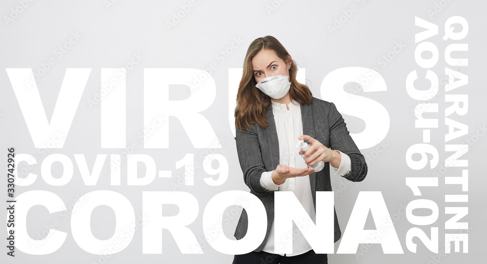Design concept of woman using rubbing alcohol to avoid Corona virus covid-19 / 2019-ncov looking afraid of being infected and sick. The virus name all around her Design concept of woman using rubbing alcohol to avoid Corona virus covid-19 / 2019-ncov looking afraid of being infected and sick. The virus name all around her