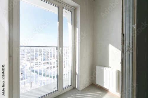 interior of the apartment without decoration in gray colors