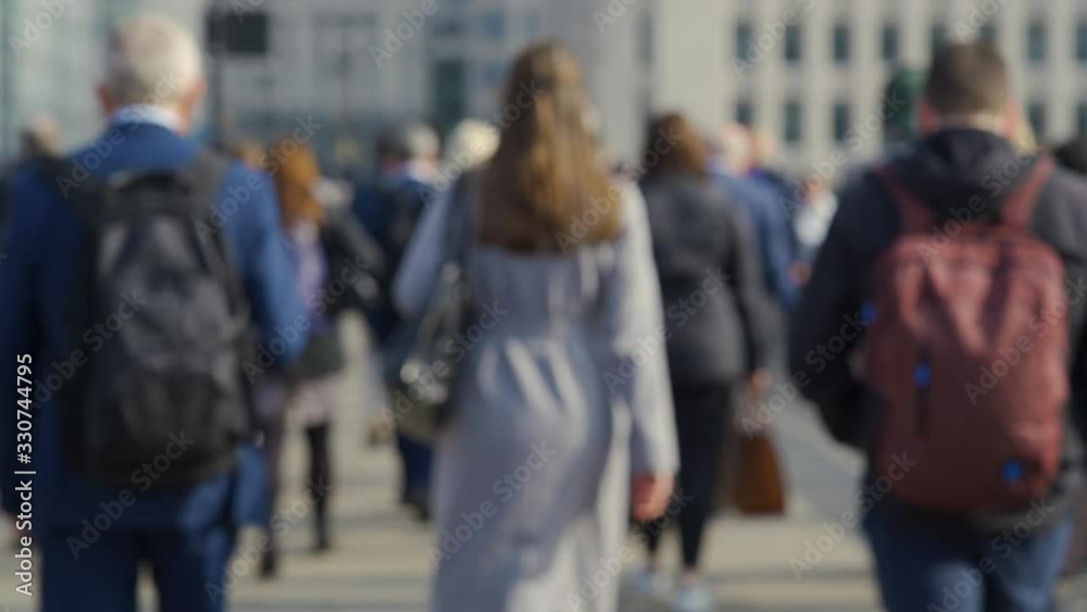 Crowd of pedestrian commuters in London on cool morning in slow motion. Clip 60d Crowd of pedestrian commuters in London on cool morning in slow motion. Clip 60d