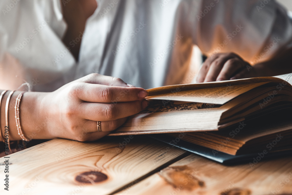 custom made wallpaper toronto digitalA woman is reading a book. Education, training, learning, hobby. Manicure