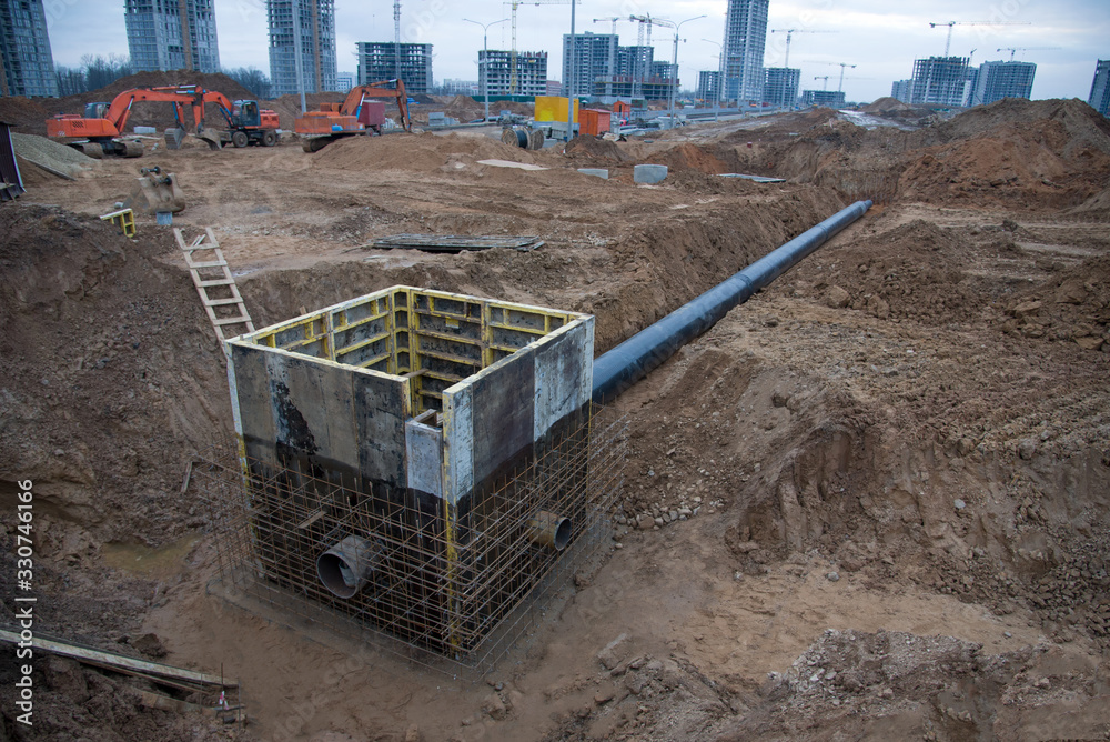 Connecting a trench drain to a concrete manhole structure at ...