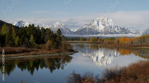 autumn morning view of mount moran in grand teton national park from oxbow bend in wyoming, usa