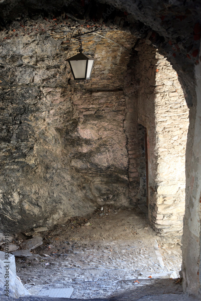Triora (IM), Italy - February 15, 2017: Old houses details in The witches village of Triora, Imperia, Liguria, Italy. Triora (IM), Italy - February 15, 2017: Old houses details in The witches village of Triora, Imperia, Liguria, Italy.