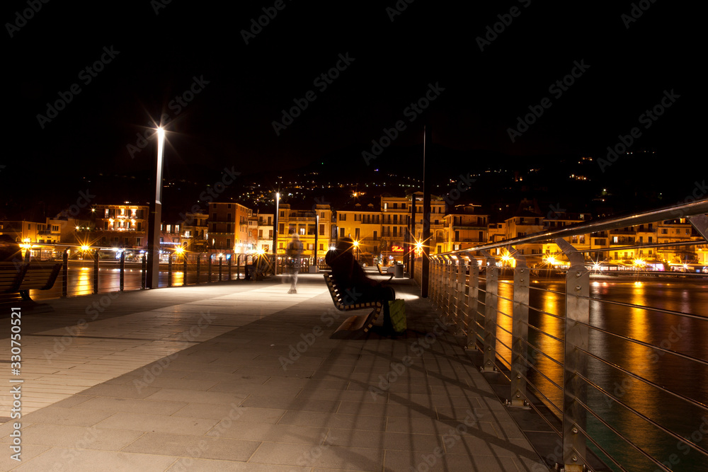Alassio (SV), Italy - February 15, 2017: Alassio pier at night, Riviera dei Fiori, Savona, Liguria, Italy.