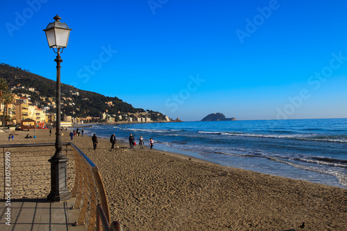 Alassio (SV), Italy - February 15, 2017: The Alassio beach, Riviera dei Fiori, Savona, Liguria, Italy. photo