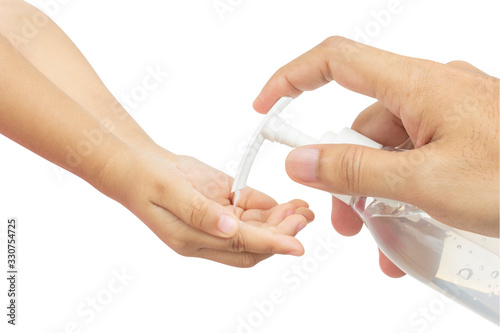 Man using squeezing hand sanitizer to palm kid. Sanitizing hands to protect from getting flu. Antibacterial antiseptic on white background.