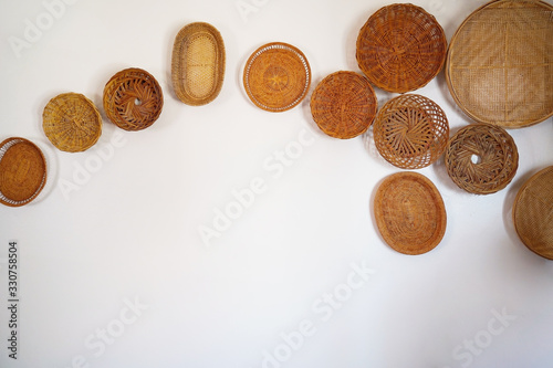 Wicker plate shape of leaves on the wall.