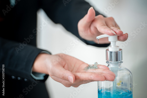 Young and young businessmen wash their hands with gel  alcohol  or soap to kill bacteria after the covid-19 virus has spread to prevent the spread of germs and bacteria.