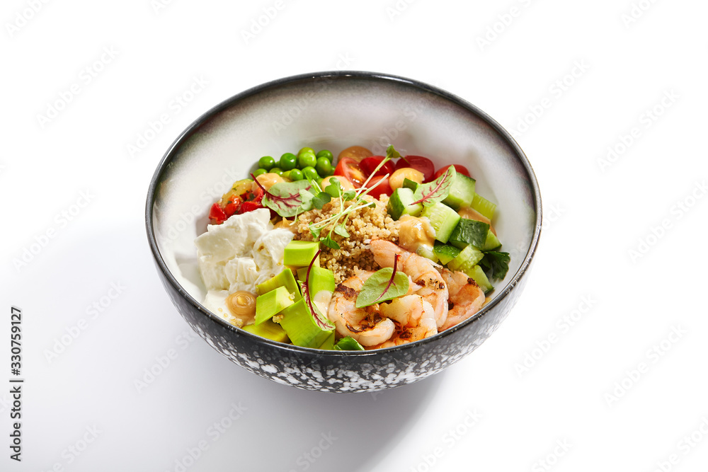 Bowl of couscous with shrimp and vegetables