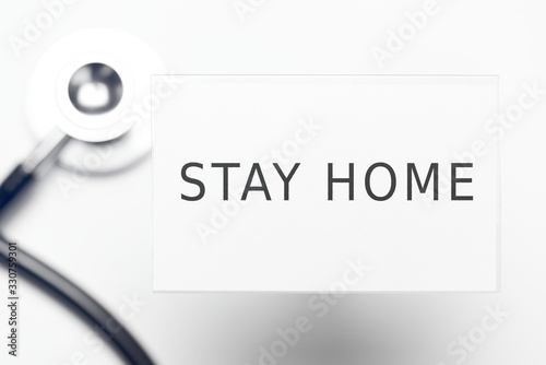 Stay home text on plastic ID badge