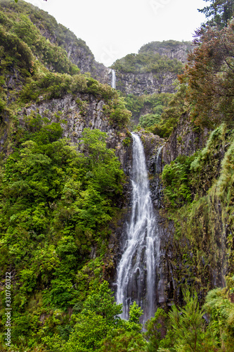 Risco waterfall on madeira island  portugal  in the middle of the tropical forest